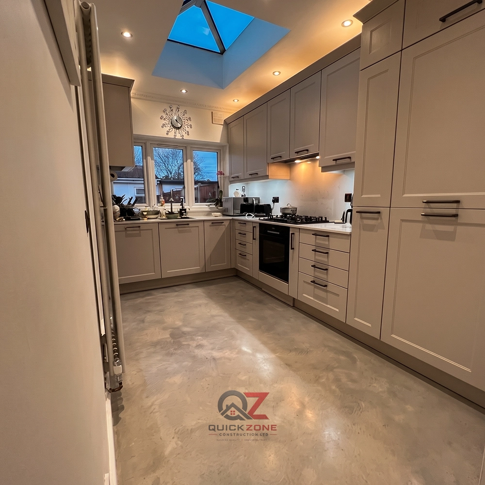 luxury kitchen renovation with black and gold finishes