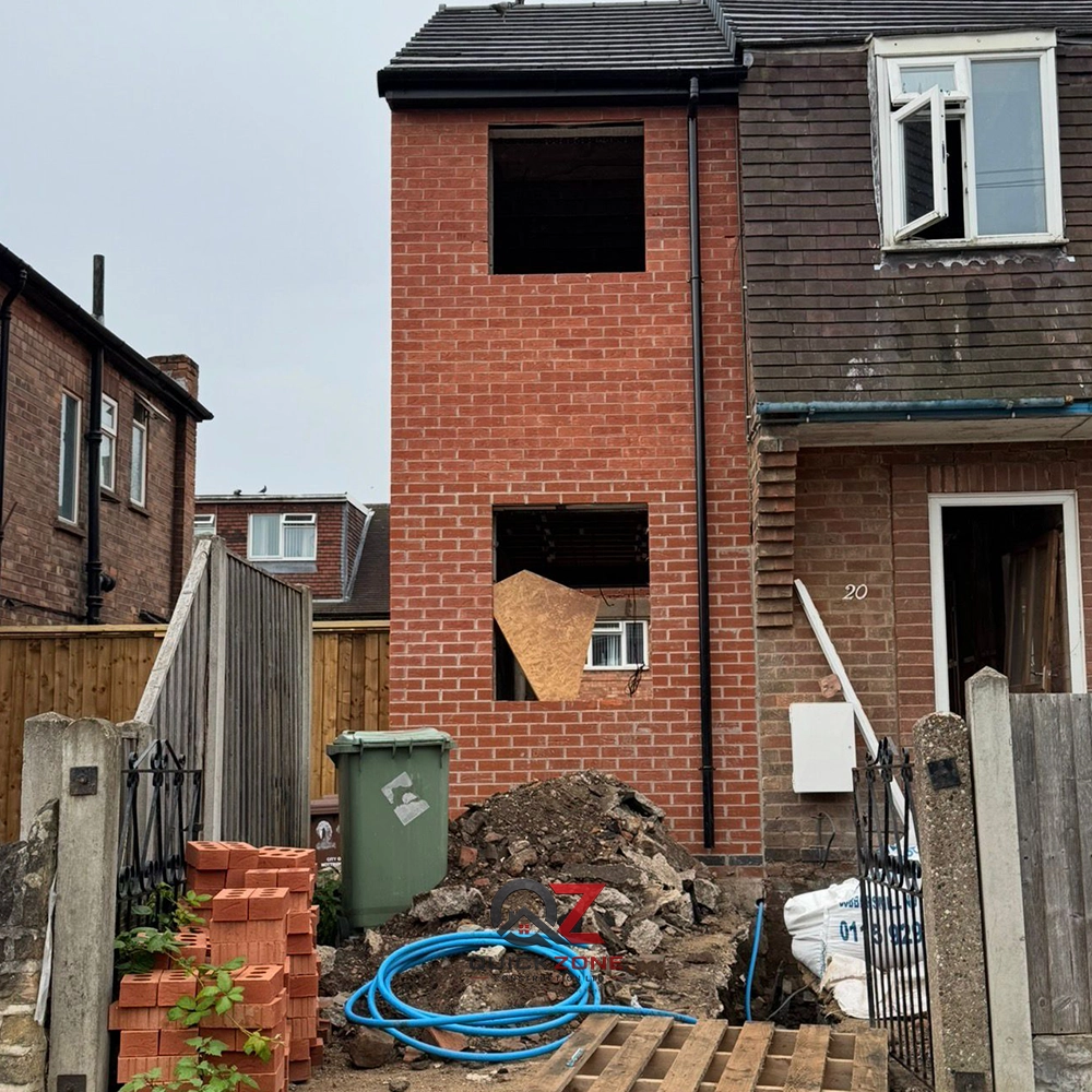 brick house double storey extension during construction phase